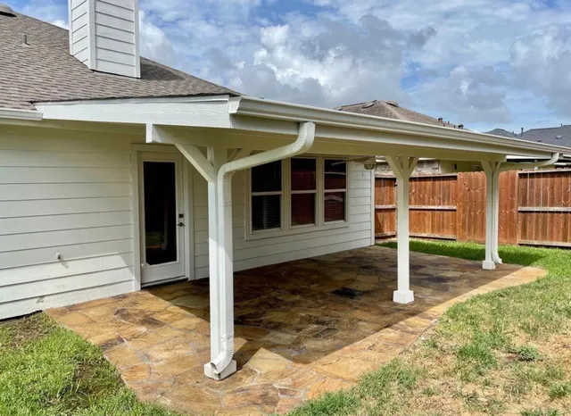 a front view of a house with a garage