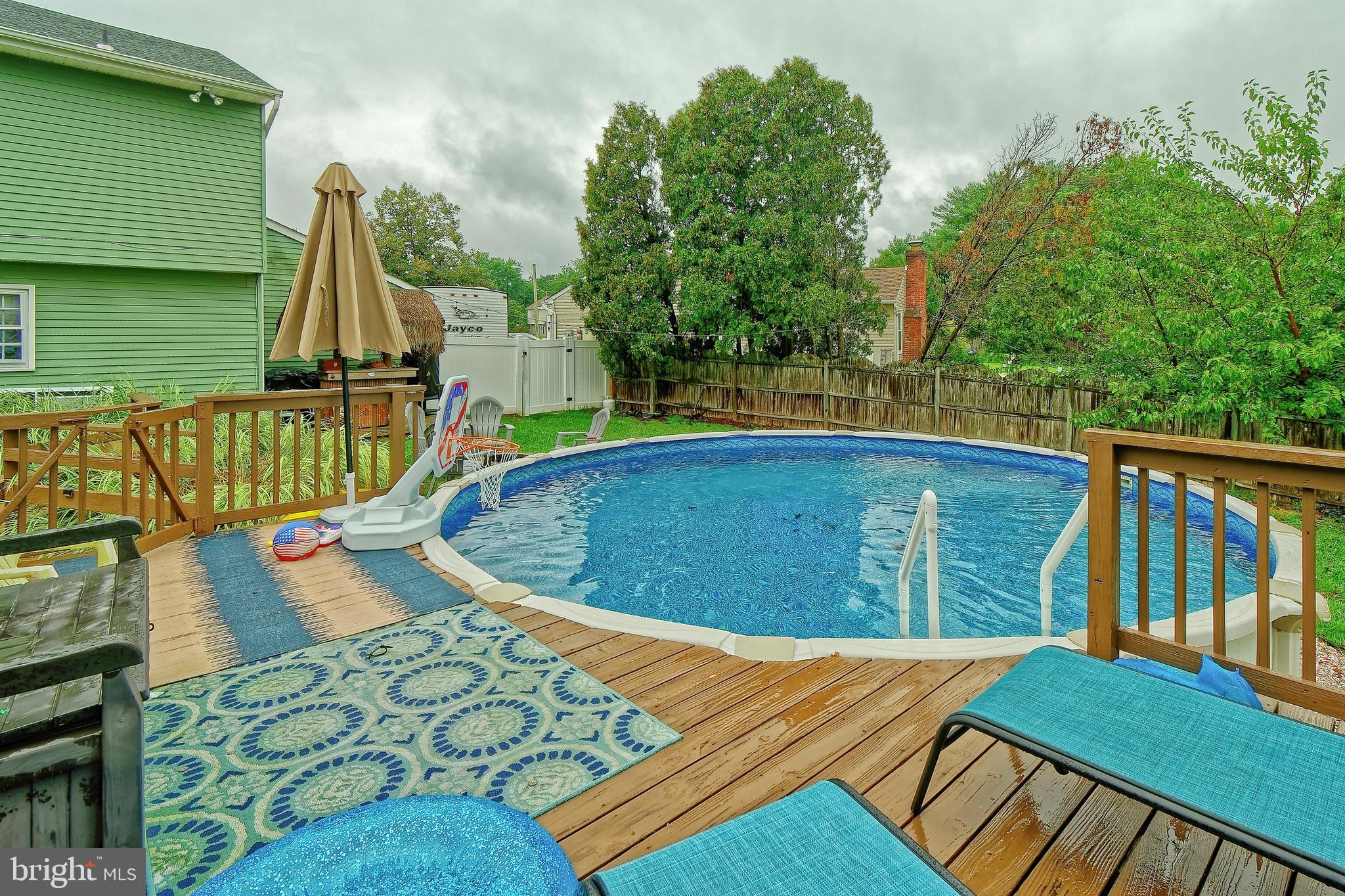 104 Hampton Court Sicklerville, NJ 08081 - Photo 19 of 26 Nice back yard with pool! (salt water)