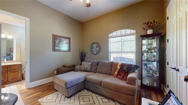 a living room with furniture and a window