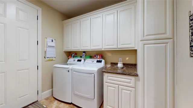 a storage room with washer and dryer