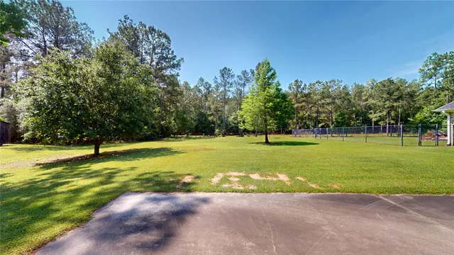 a view of a golf course with a trees
