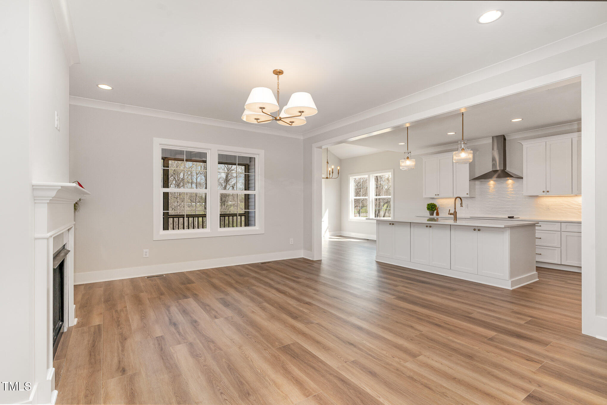 57 Nottoway Lane Wendell, NC 27591 - Photo 14 of 42 a view of kitchen with granite countertop cabinets a sink and a dishwasher with wooden floor