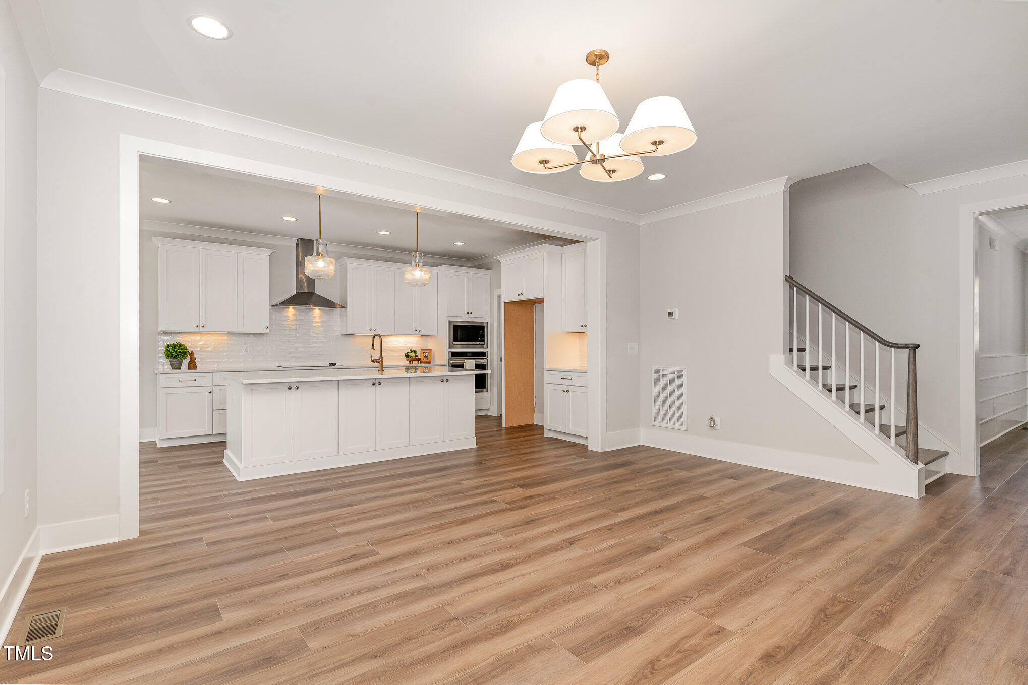 57 Nottoway Lane Wendell, NC 27591 - Photo 15 of 42 a view of kitchen dining table wooden floor and a kitchen view