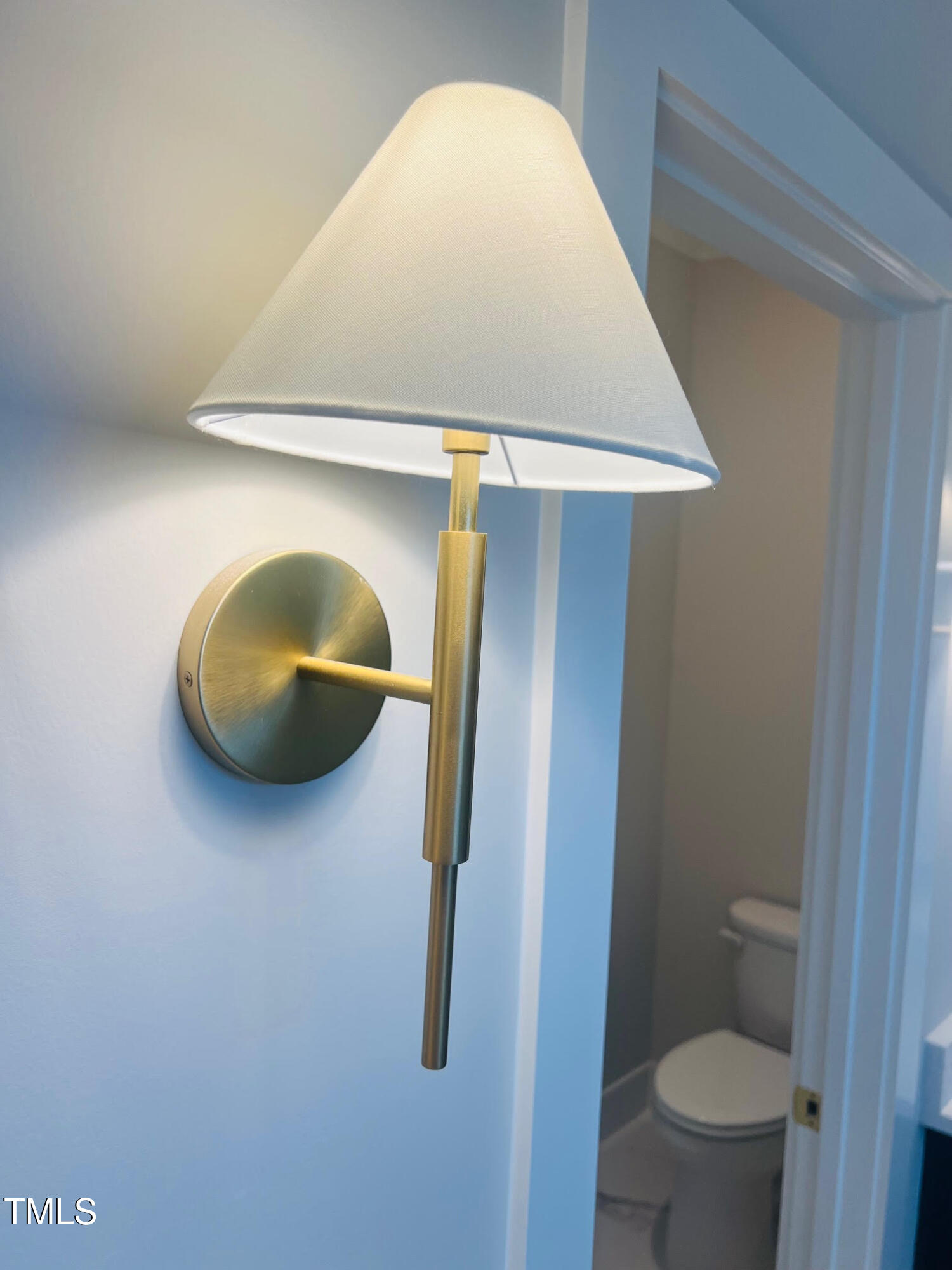 57 Nottoway Lane Wendell, NC 27591 - Photo 41 of 42 a bathroom with a toilet and a sink