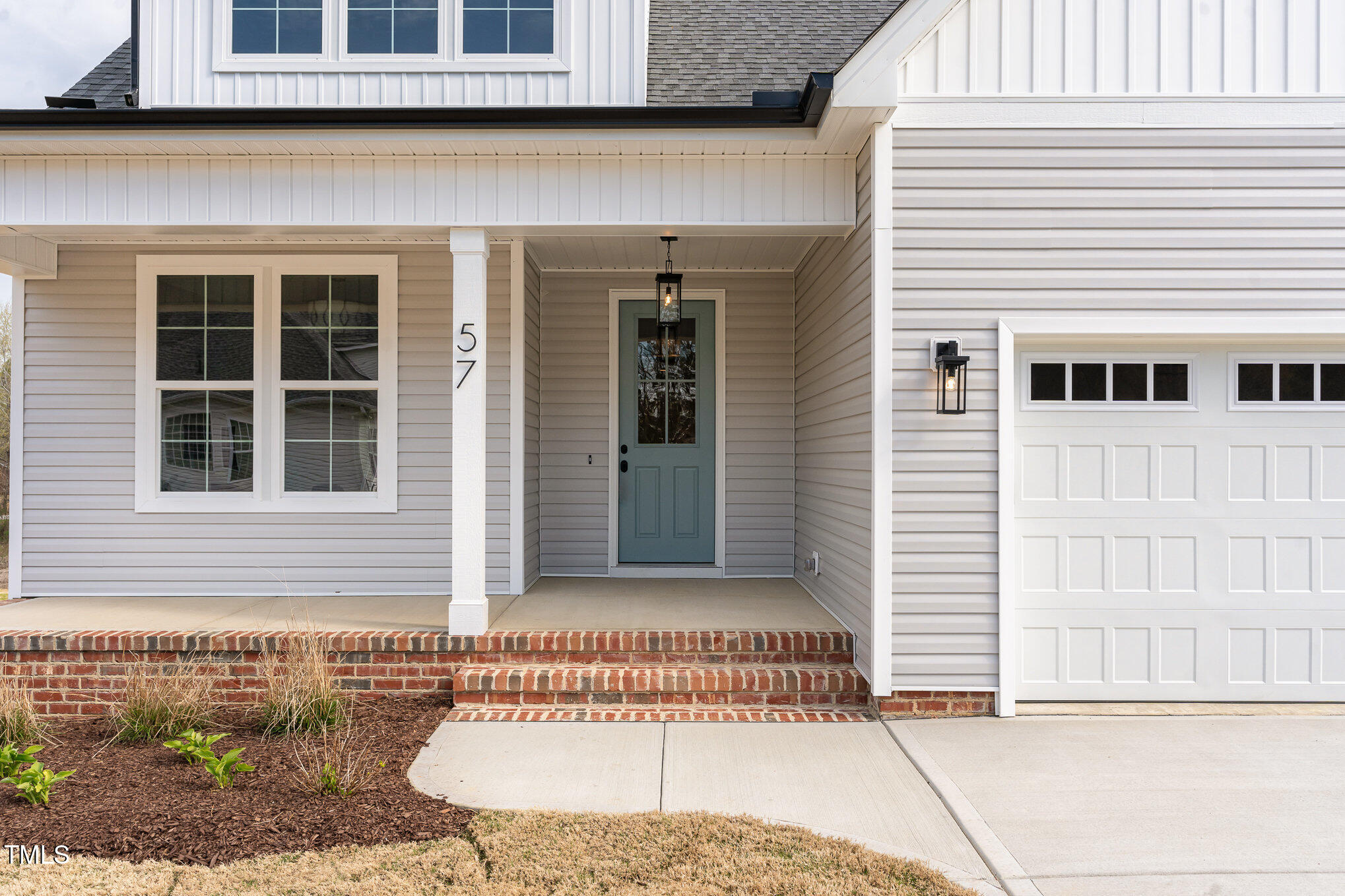 57 Nottoway Lane Wendell, NC 27591 - Photo 6 of 42 a front view of a house with a garage