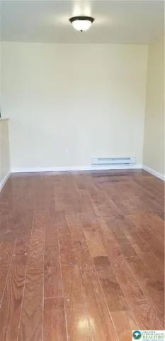 a view of a room with an empty space