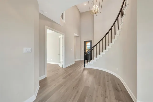 a view of staircase with wooden floor and staircase