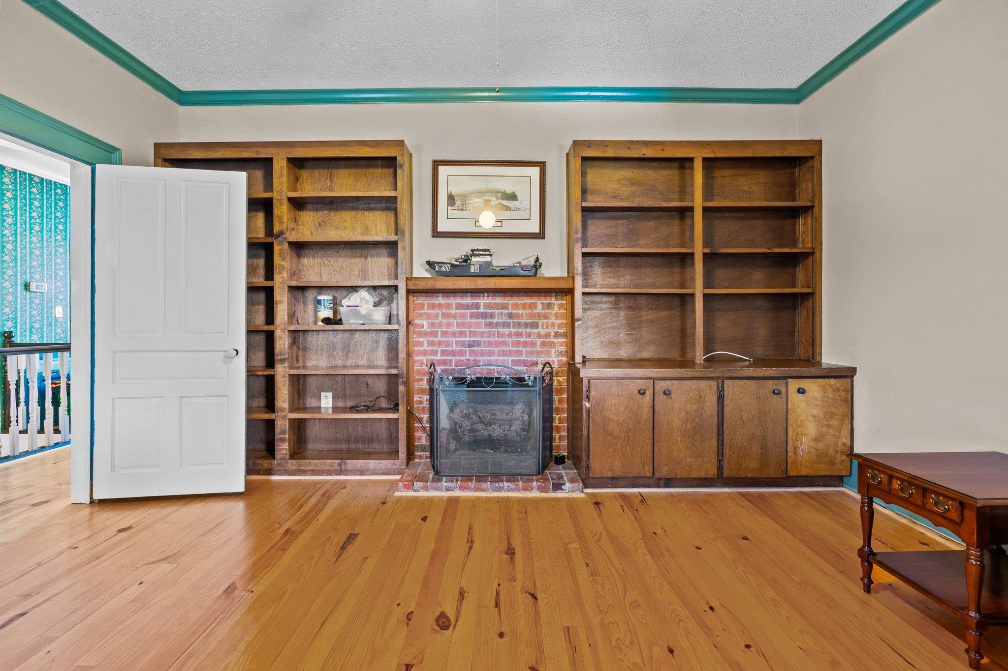 407 Old Post Road Erwin, NC 28339 - Photo 18 of 44 a room with a bookshelf and a book shelf