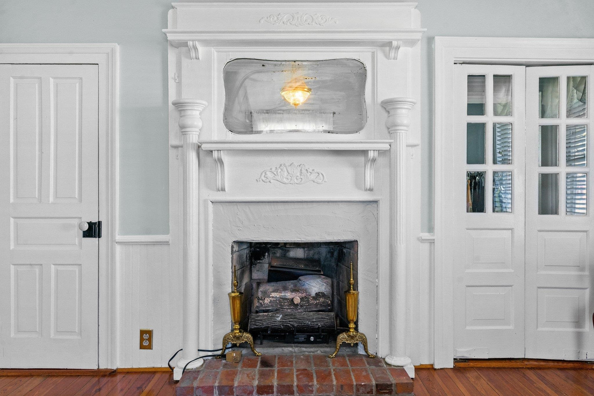 407 Old Post Road Erwin, NC 28339 - Photo 19 of 44 a living room with furniture and a fireplace