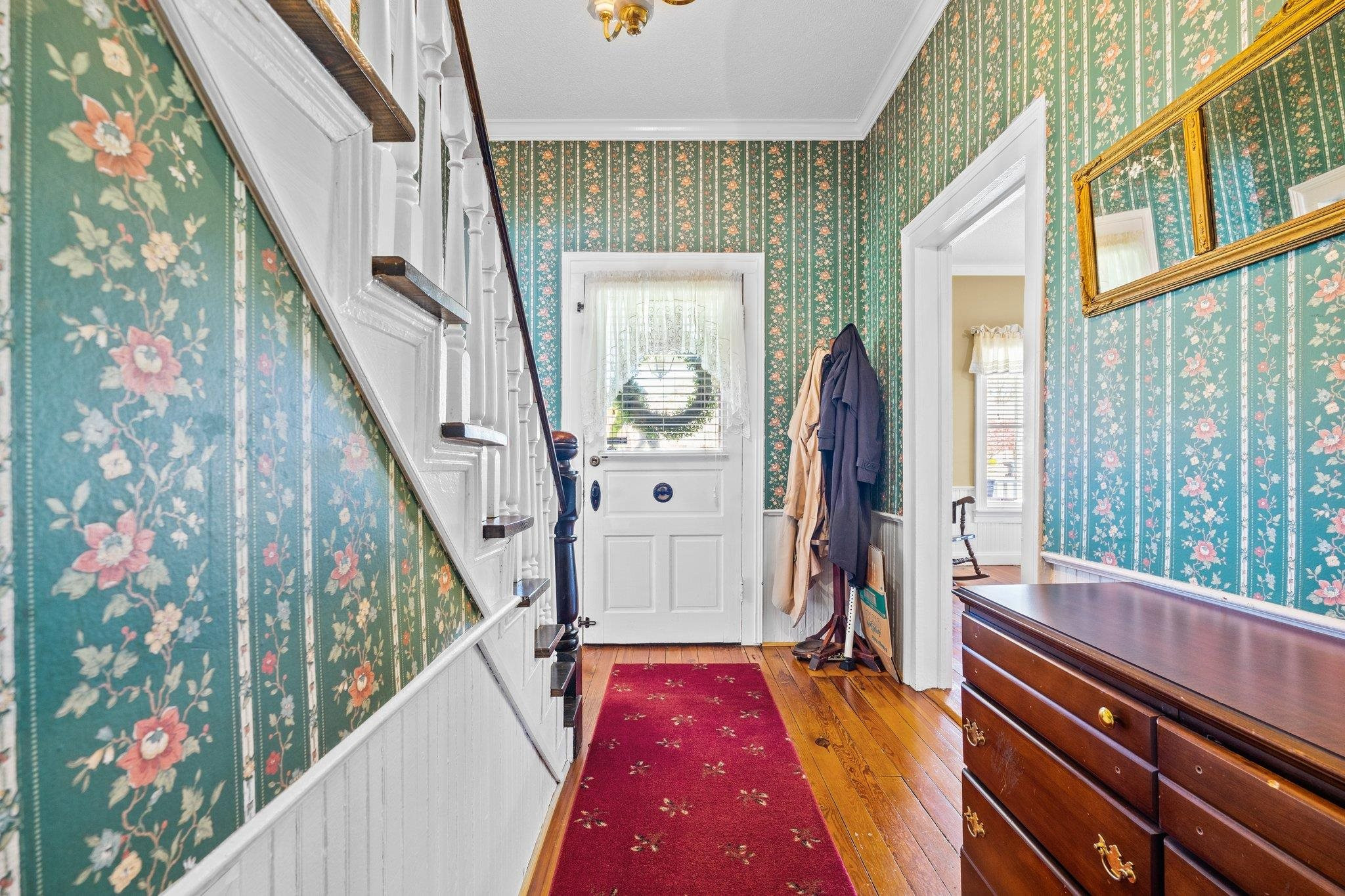 407 Old Post Road Erwin, NC 28339 - Photo 24 of 44 a view of an entryway with wooden floor and stairs