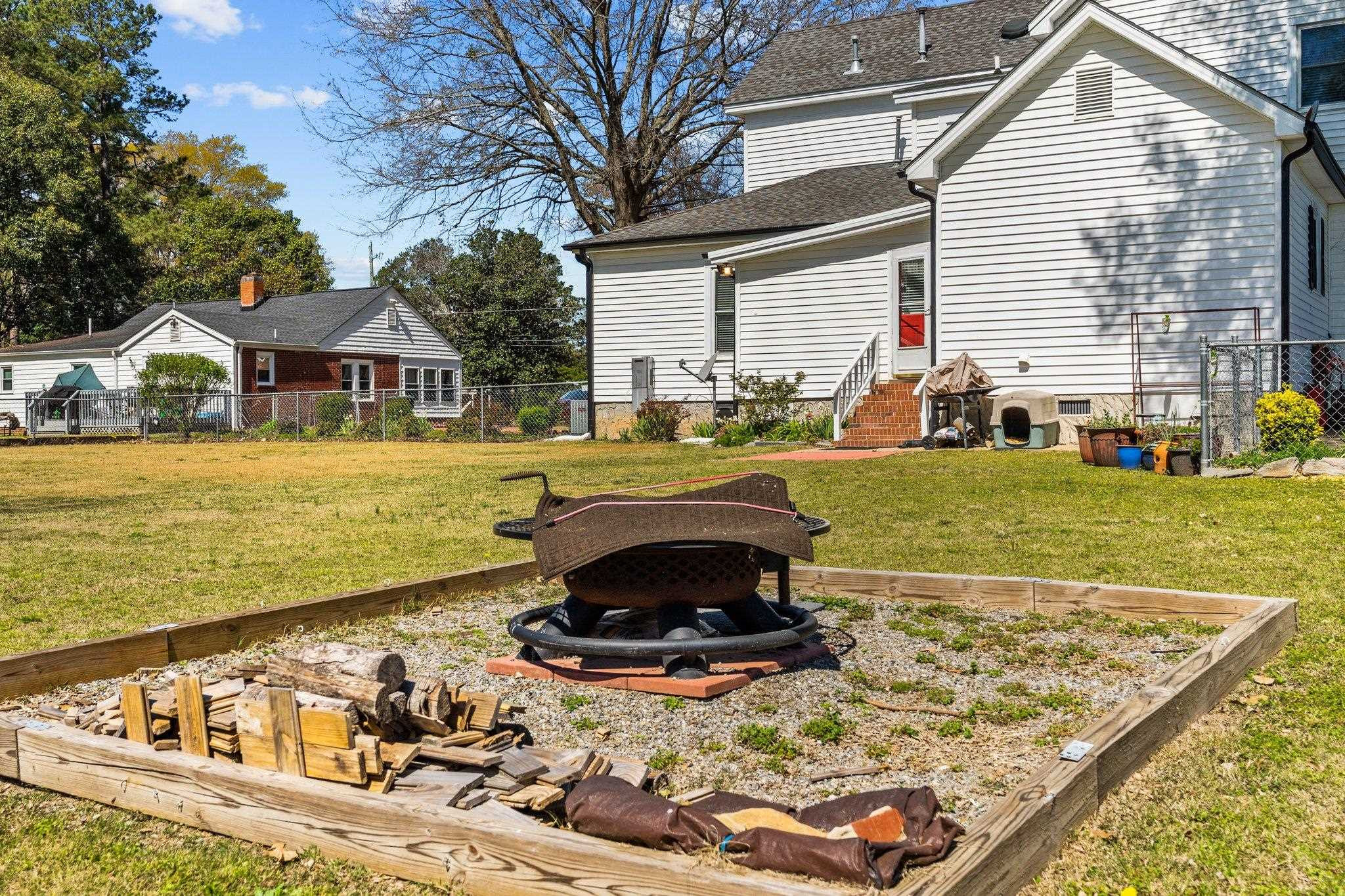 407 Old Post Road Erwin, NC 28339 - Photo 33 of 44 a view of a house with yard and swimming pool