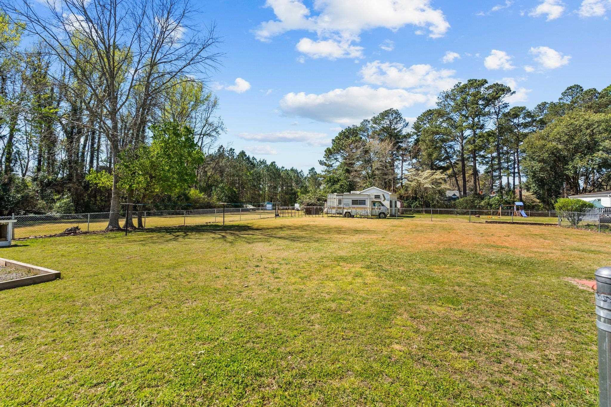 407 Old Post Road Erwin, NC 28339 - Photo 36 of 44 a view of swimming pool with an outdoor space and seating area