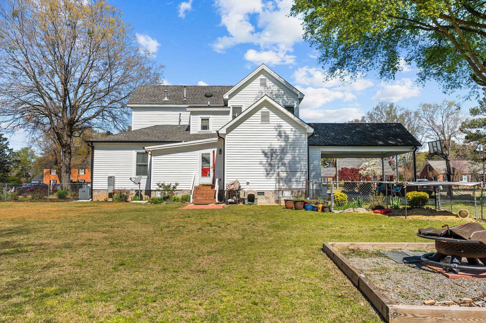 407 Old Post Road Erwin, NC 28339 - Photo 39 of 44 a view of a house with a yard and sitting area