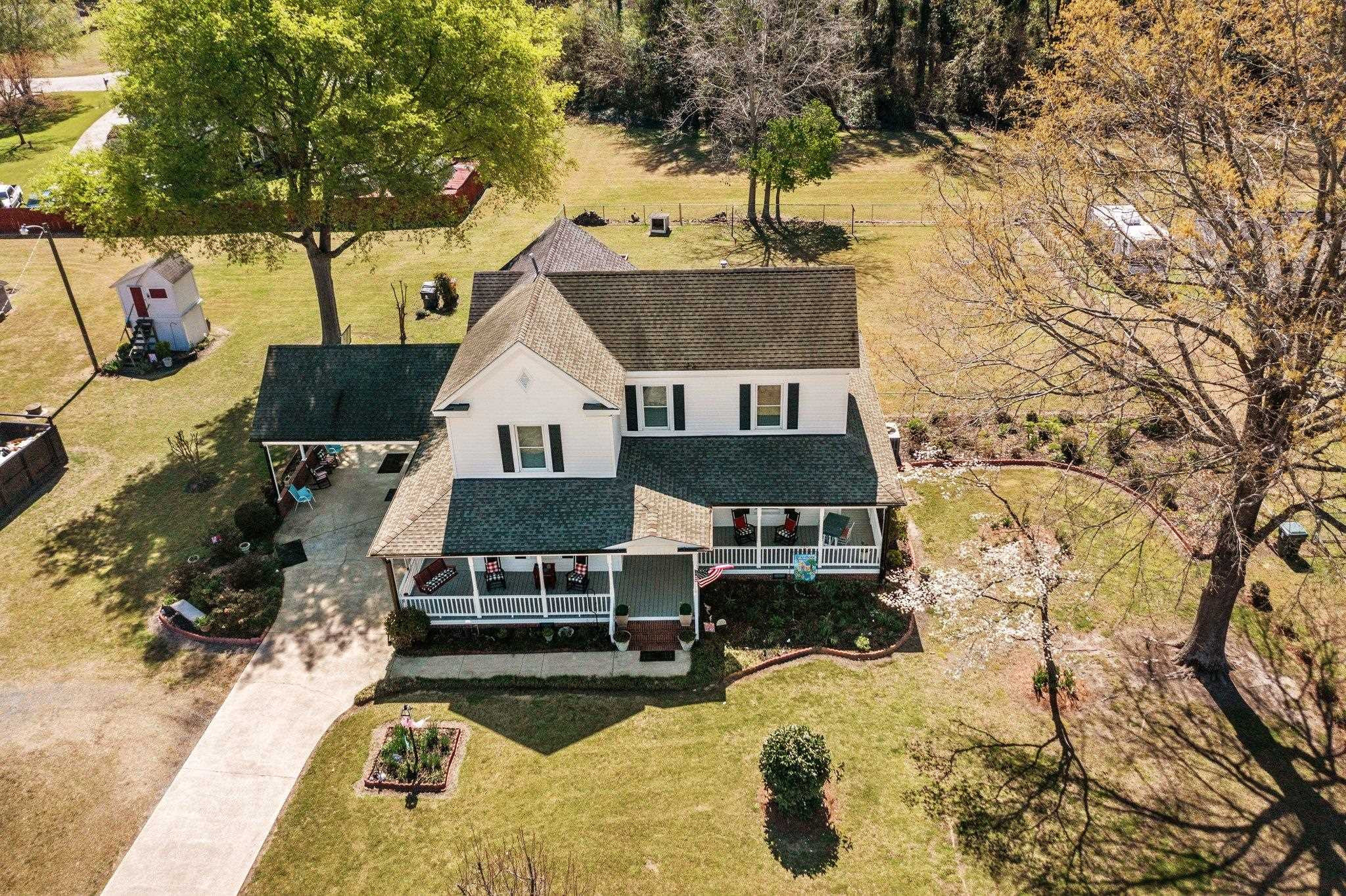 407 Old Post Road Erwin, NC 28339 - Photo 40 of 44 a view of balcony with wooden floor and outdoor seating