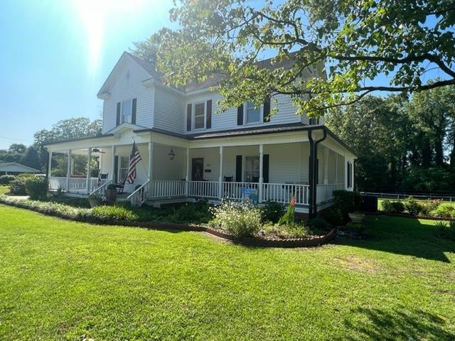 407 Old Post Road Erwin, NC 28339 - Photo 44 of 44 a front view of a house with garden