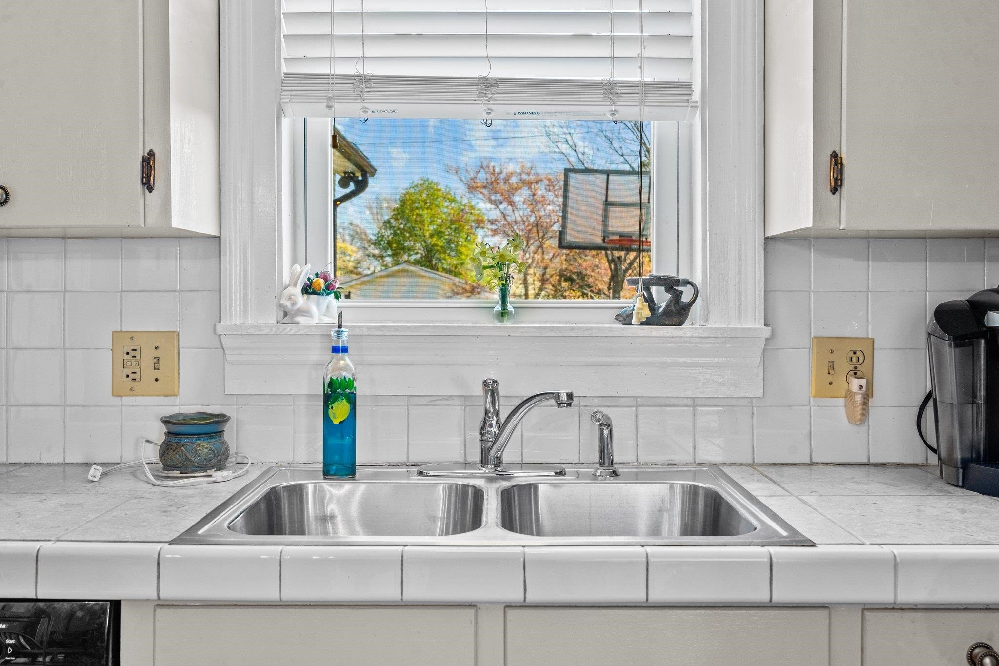 407 Old Post Road Erwin, NC 28339 - Photo 5 of 44 a kitchen with a sink and a window