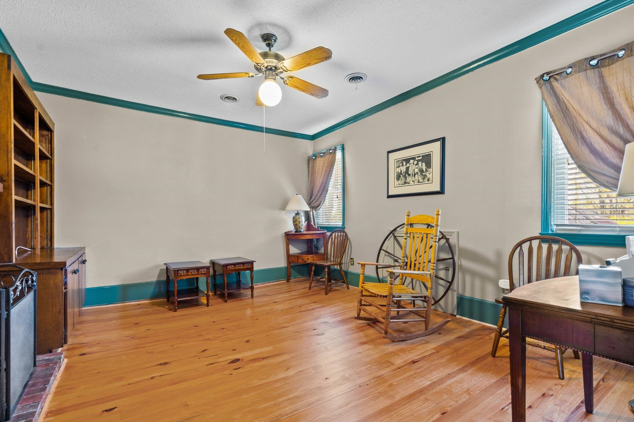 407 Old Post Road Erwin, NC 28339 - Photo 7 of 44 a living room with furniture and a wooden floor