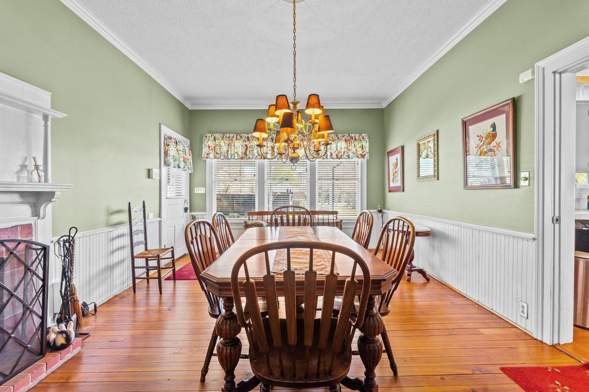 407 Old Post Road Erwin, NC 28339 - Photo 8 of 44 a view of a dining room with furniture window and wooden floor