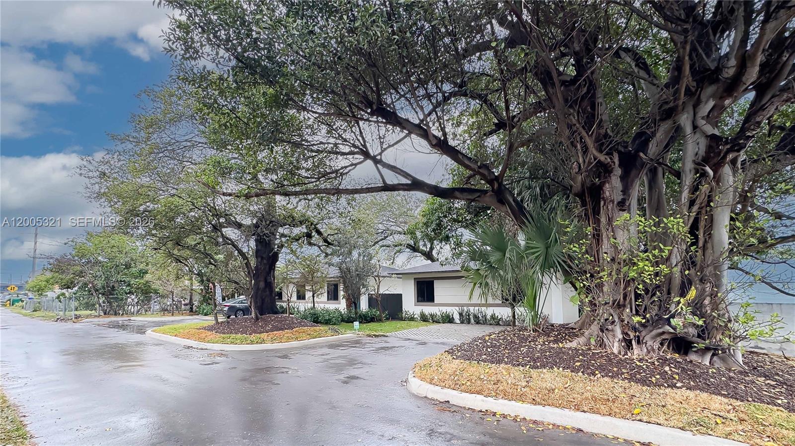4517 Northwest 3rd Street, Unit 4517 Miami, FL 33126 - Photo 5 of 12 a view of a house with basketball court