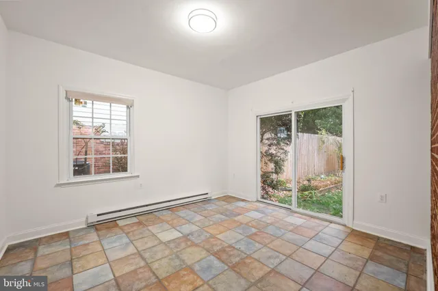 an empty room with windows