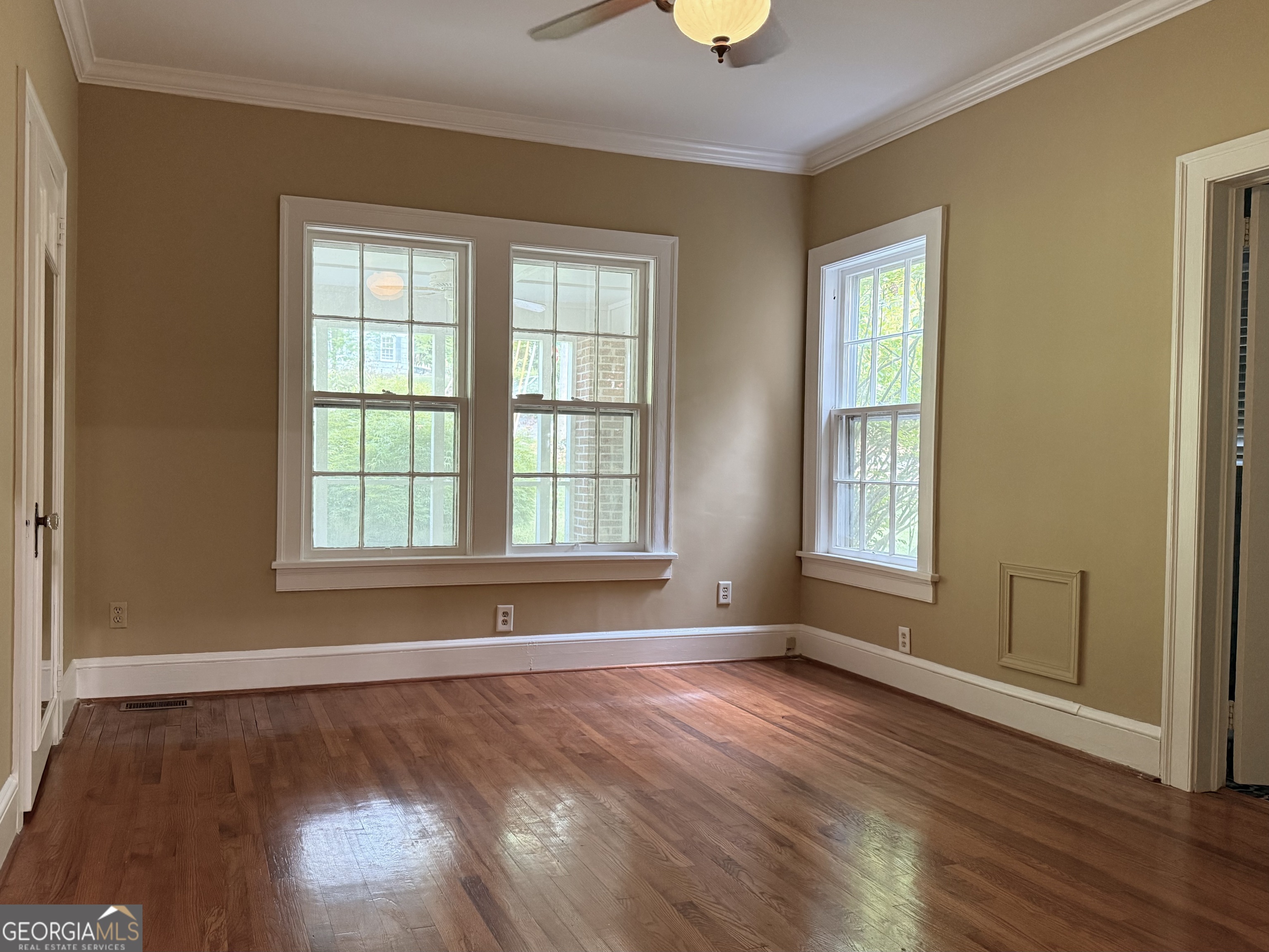 19 Berckmans Lane Southwest Rome, GA 30165 - Photo 14 of 32 an empty room with wooden floor and windows