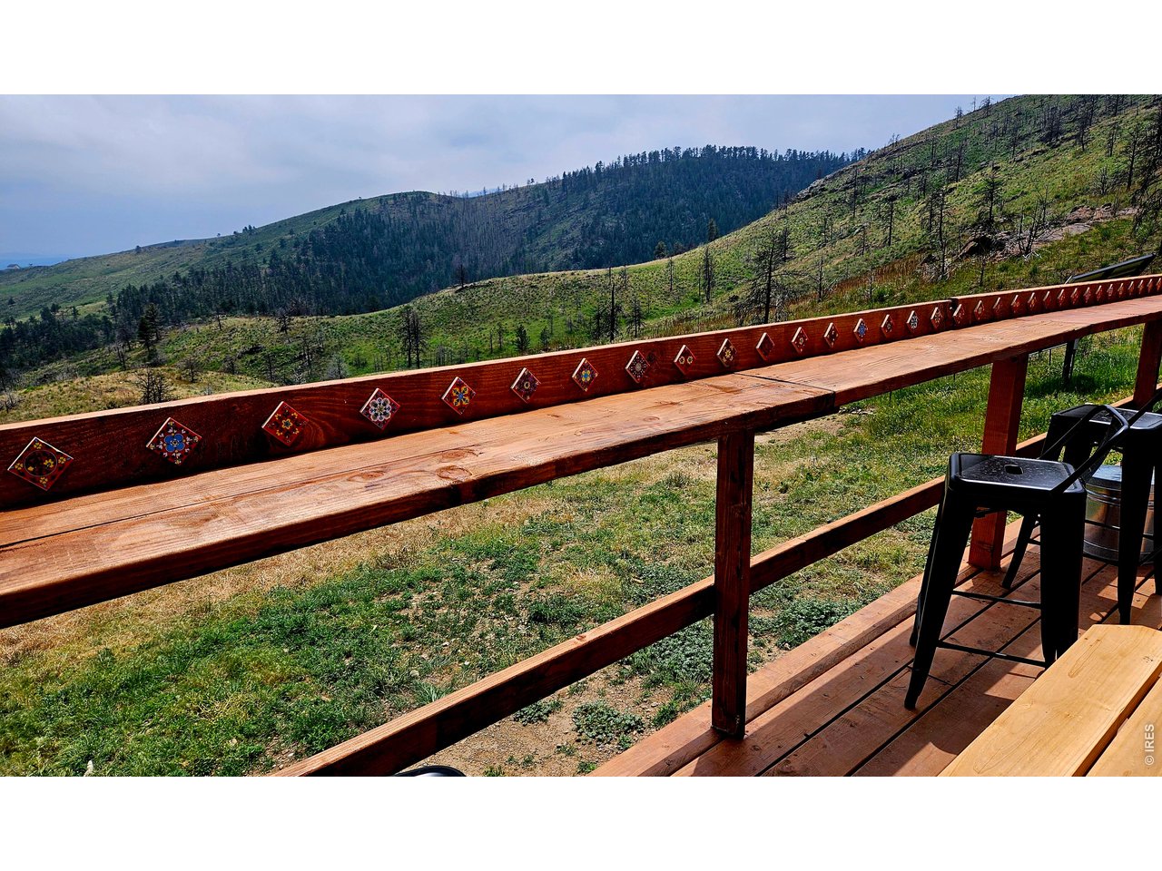 957 Stringtown Gulch Road Bellvue, CO 80512 - Photo 13 of 17 a view of mountain view from a balcony