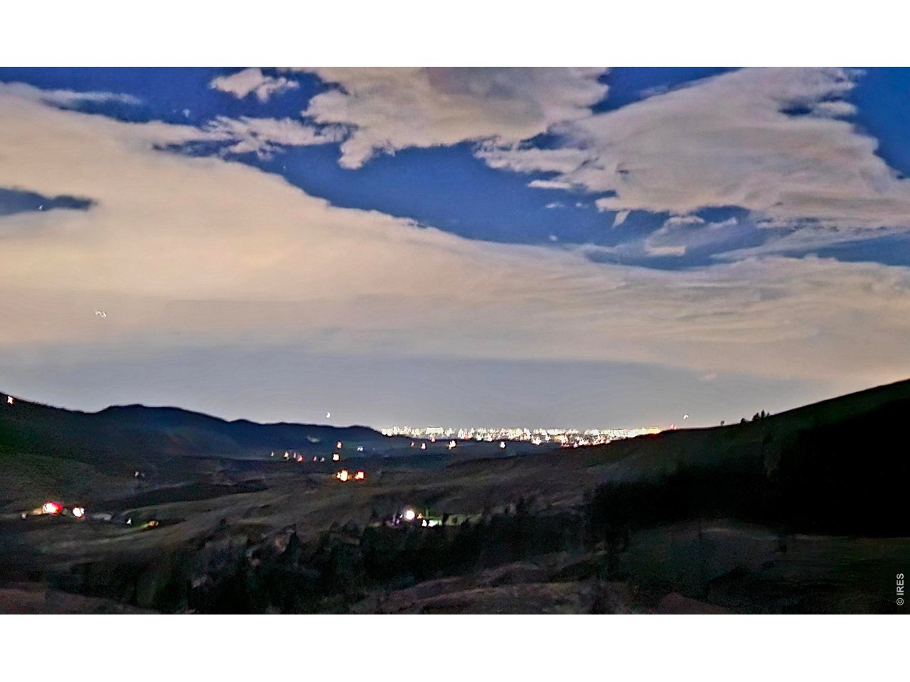 957 Stringtown Gulch Road Bellvue, CO 80512 - Photo 8 of 17 a black and white photo of a sunset