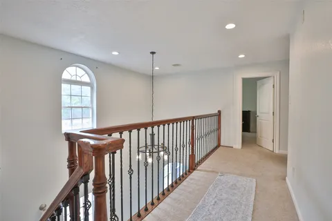 a view of entryway with stairs