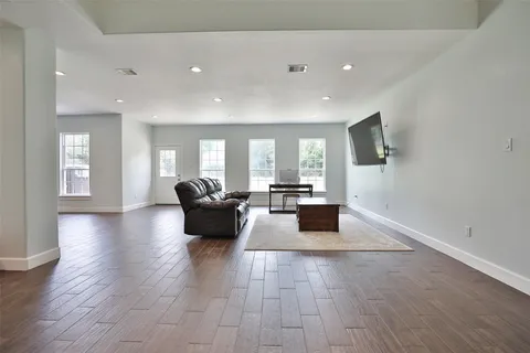 a living room with furniture and a couch