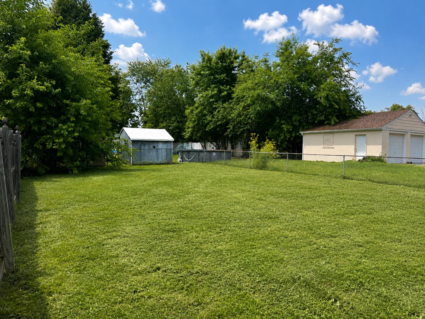 410 Austin Court Wallingford, PA 19086 - Photo 15 of 16 Partially fenced yard with shed-near park!