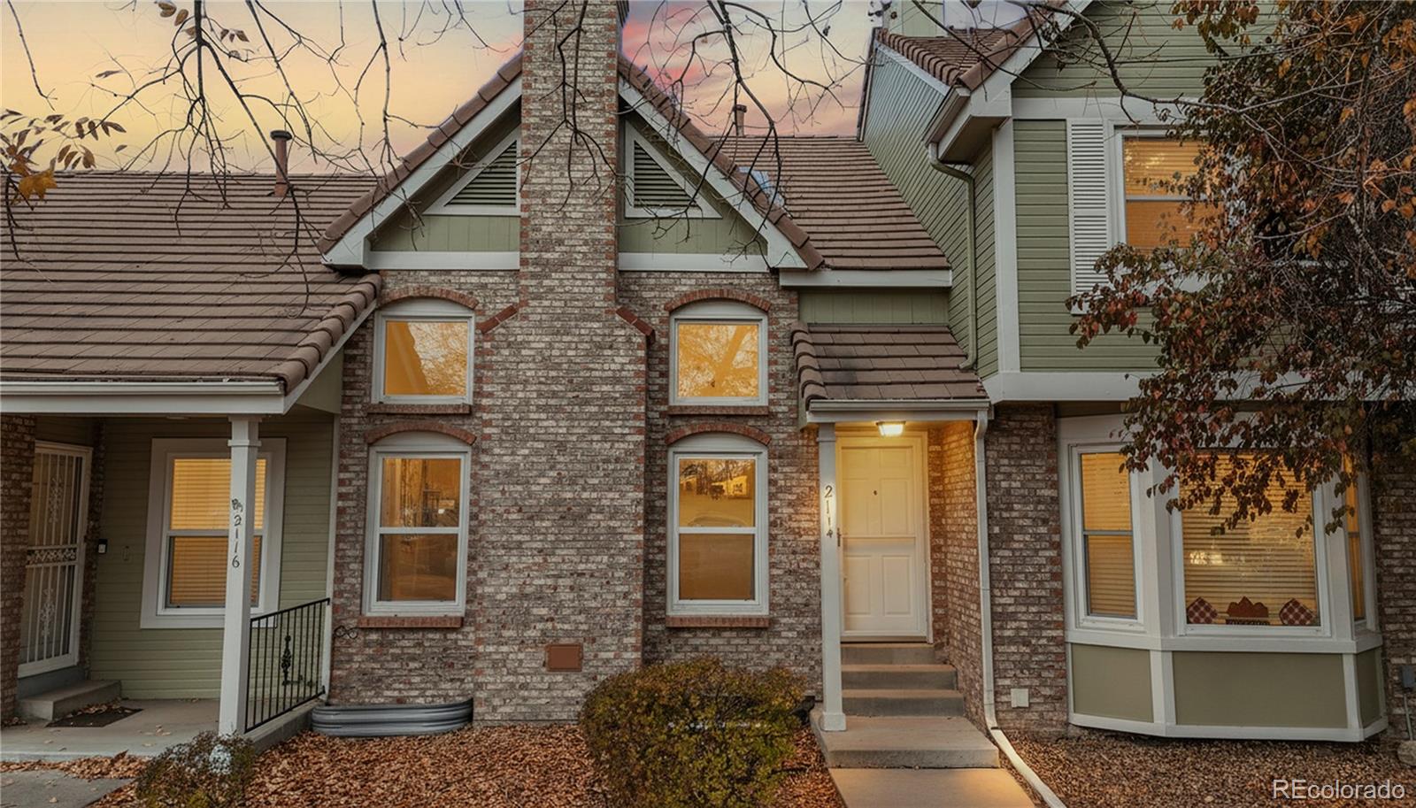 a front view of a house with glass windows