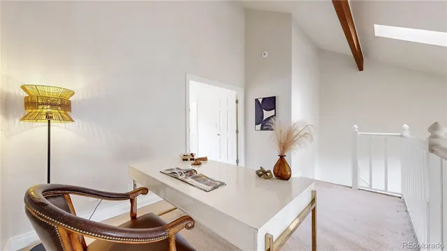 a dining room with table and chairs