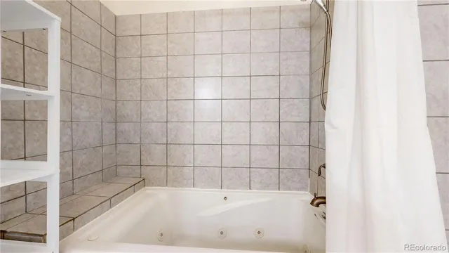 a bathroom with a bathtub