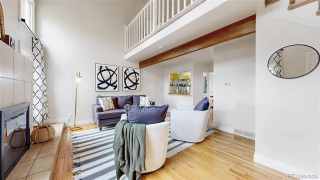 a view of living room and workspace