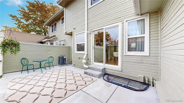 two chairs and a table in a house
