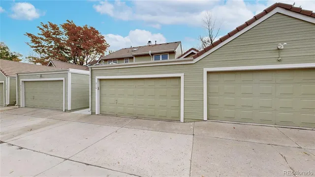 a front view of a house with a garage