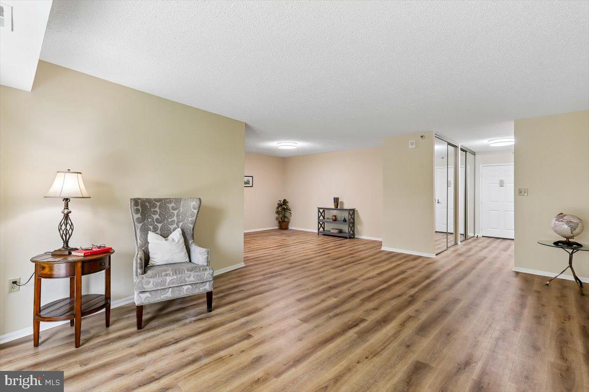 15101 Interlachen Drive, Unit 1614 Silver Spring, MD 20906 - Photo 12 of 41 Living room into dining room