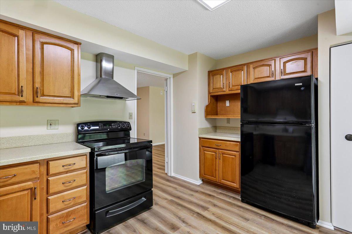 15101 Interlachen Drive, Unit 1614 Silver Spring, MD 20906 - Photo 18 of 41 Updated overhead range hood