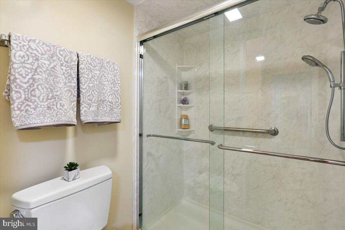 15101 Interlachen Drive, Unit 1614 Silver Spring, MD 20906 - Photo 23 of 41 Primary updated walk in shower