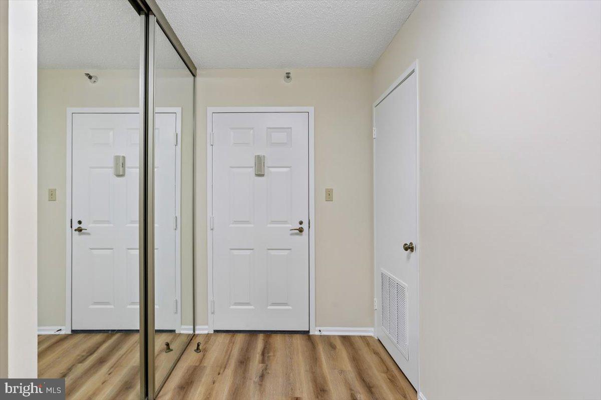 15101 Interlachen Drive, Unit 1614 Silver Spring, MD 20906 - Photo 6 of 41 Multiple hall closets