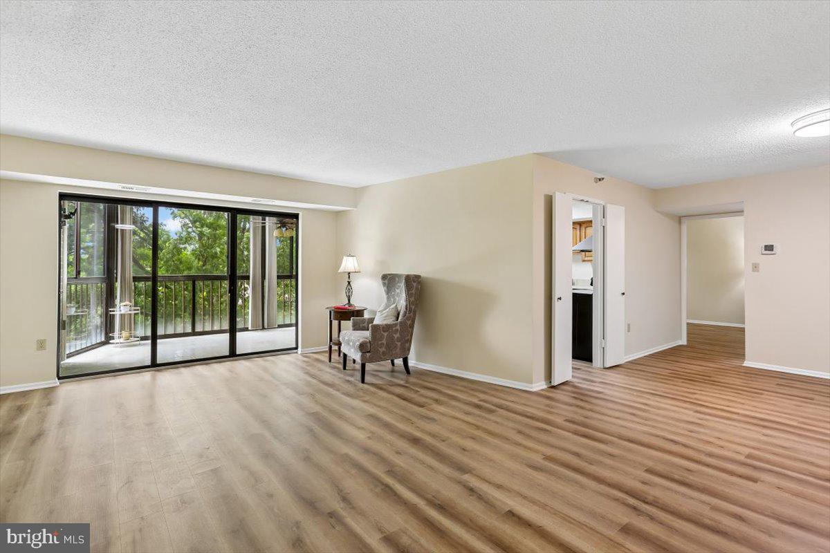 15101 Interlachen Drive, Unit 1614 Silver Spring, MD 20906 - Photo 7 of 41 Spacious and bright w/ all new LVP flooring