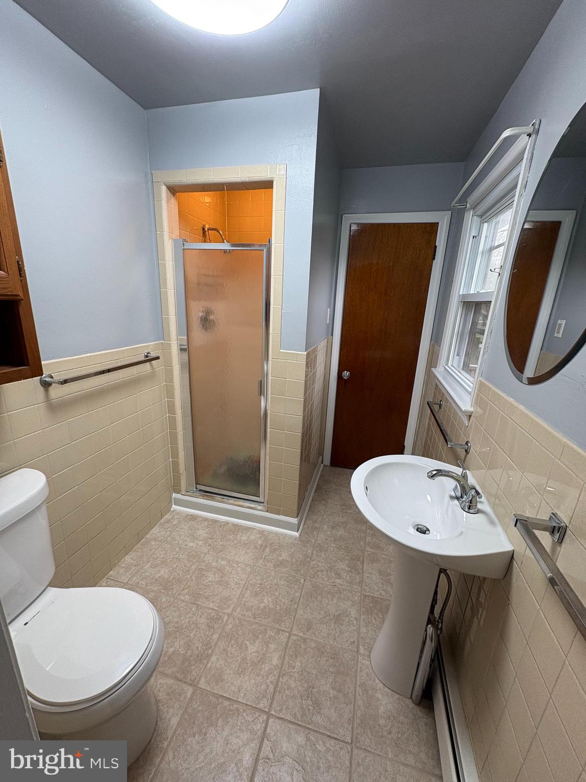 605 Union Mill Road Mount Laurel, NJ 08054 - Photo 13 of 13 a bathroom with a toilet sink and mirror