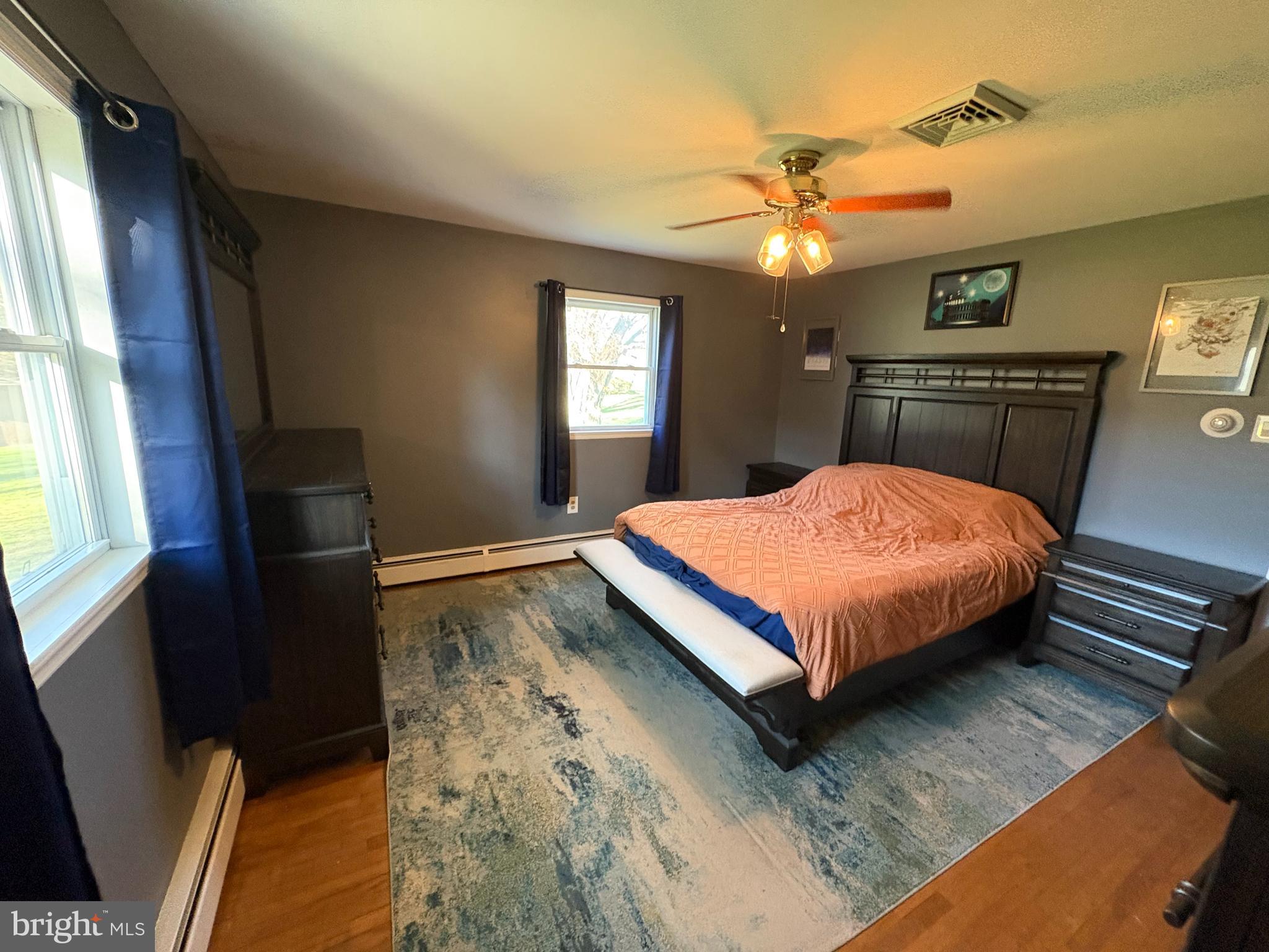 605 Union Mill Road Mount Laurel, NJ 08054 - Photo 9 of 13 a bedroom with a bed and a chandelier