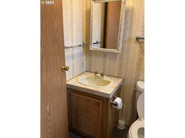 a bathroom with a tub and shower