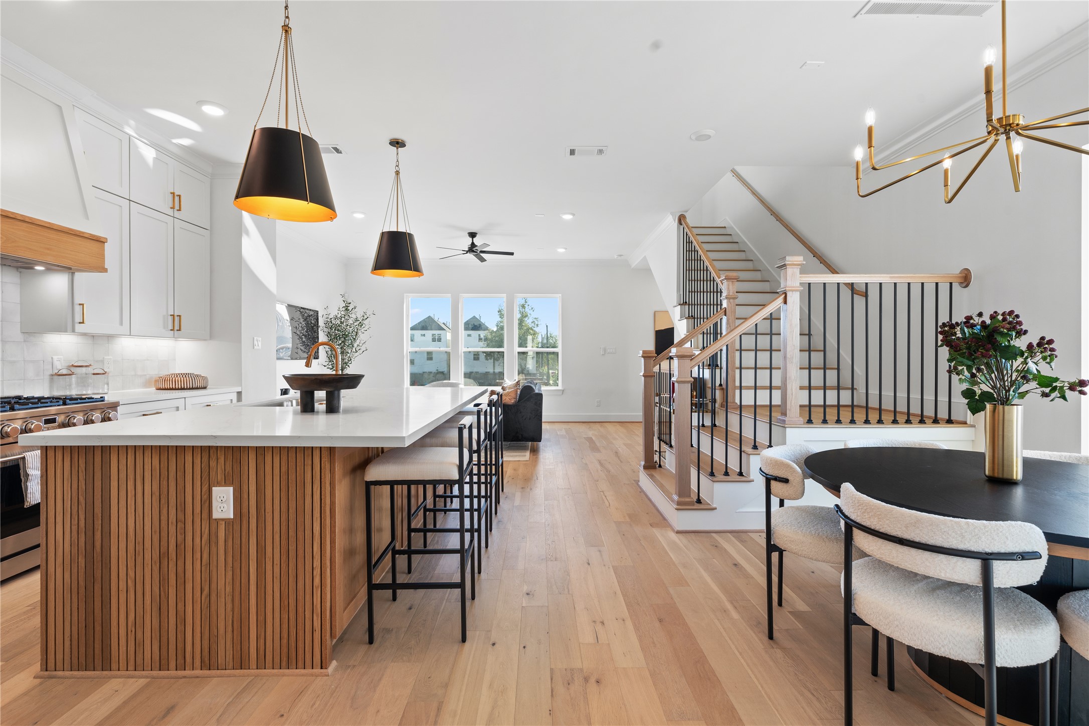 1614 Ojeman Road, Unit I Houston, TX 77055 - Photo 16 of 49 Open-concept kitchen and living area with a warm, inviting atmosphere.