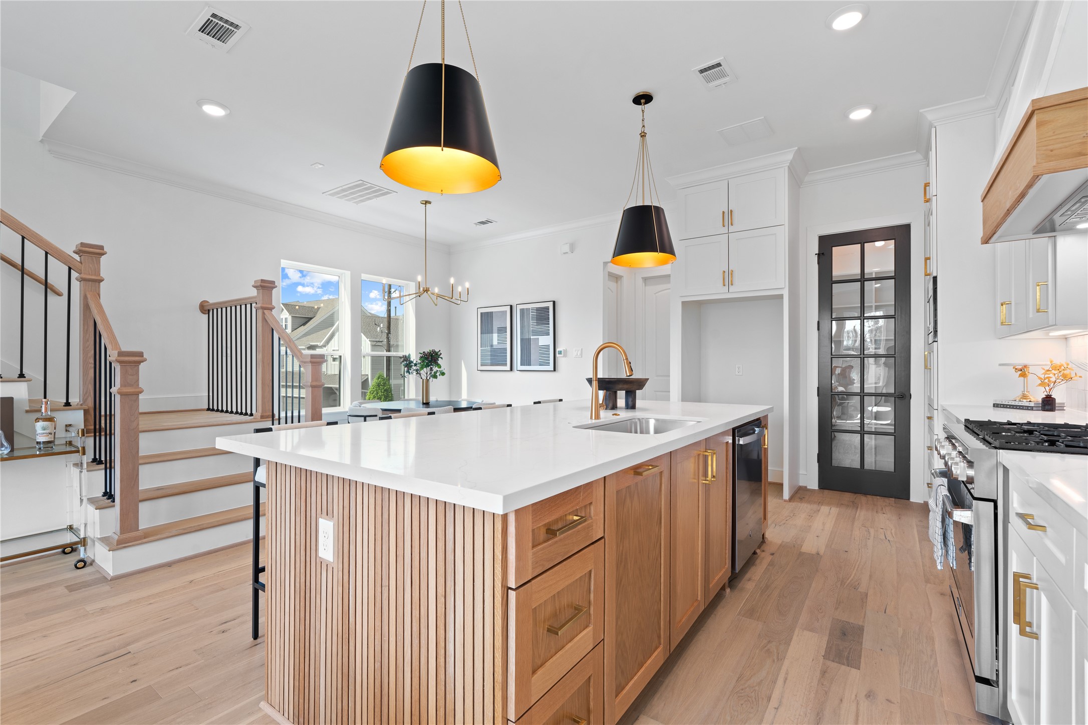 1614 Ojeman Road, Unit I Houston, TX 77055 - Photo 20 of 49 Central island with wood accents throughout.