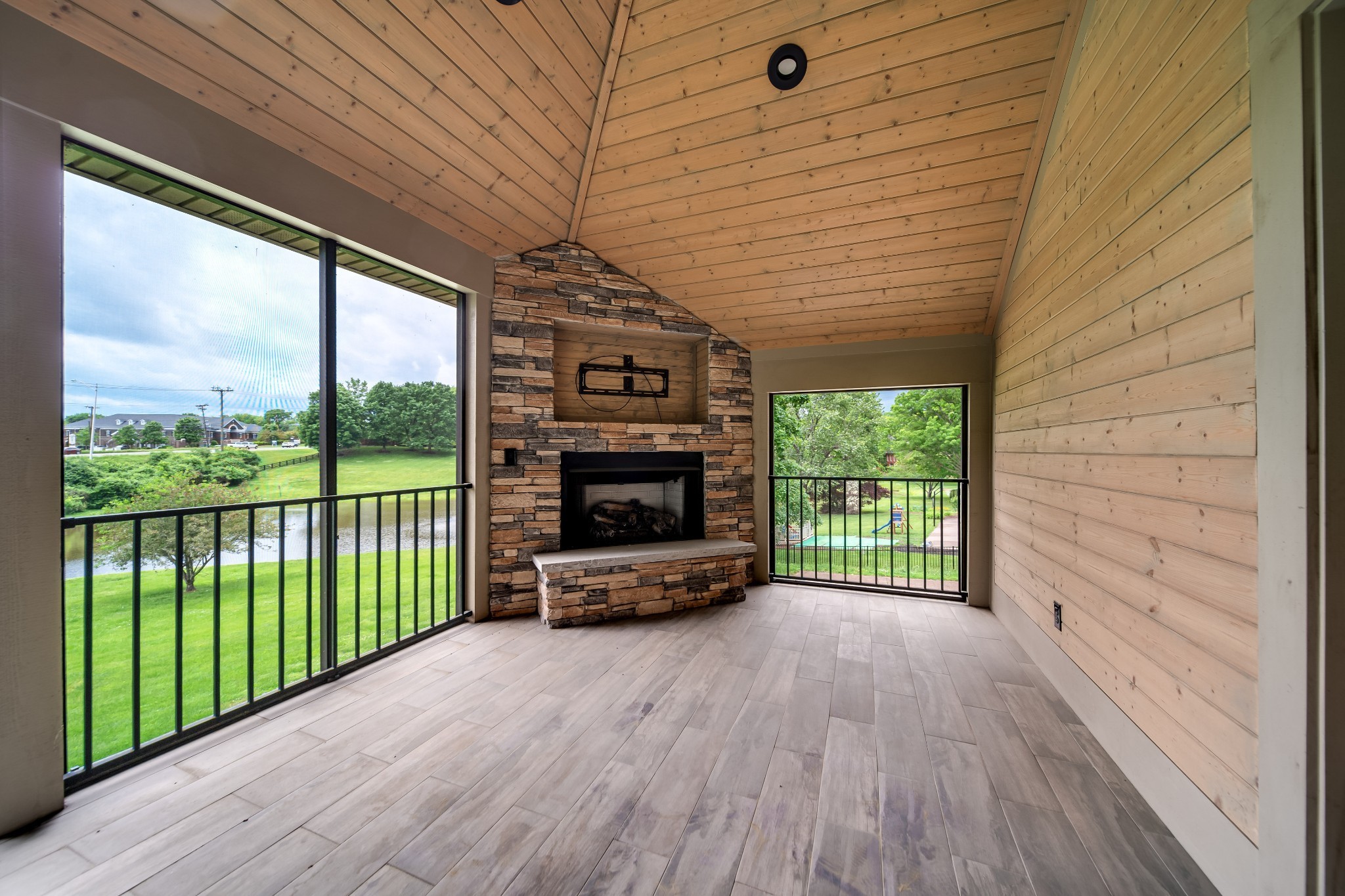 116 Foxcross Road Hendersonville, TN 37075 - Photo 52 of 57 a view of a porch with wooden floor and a balcony