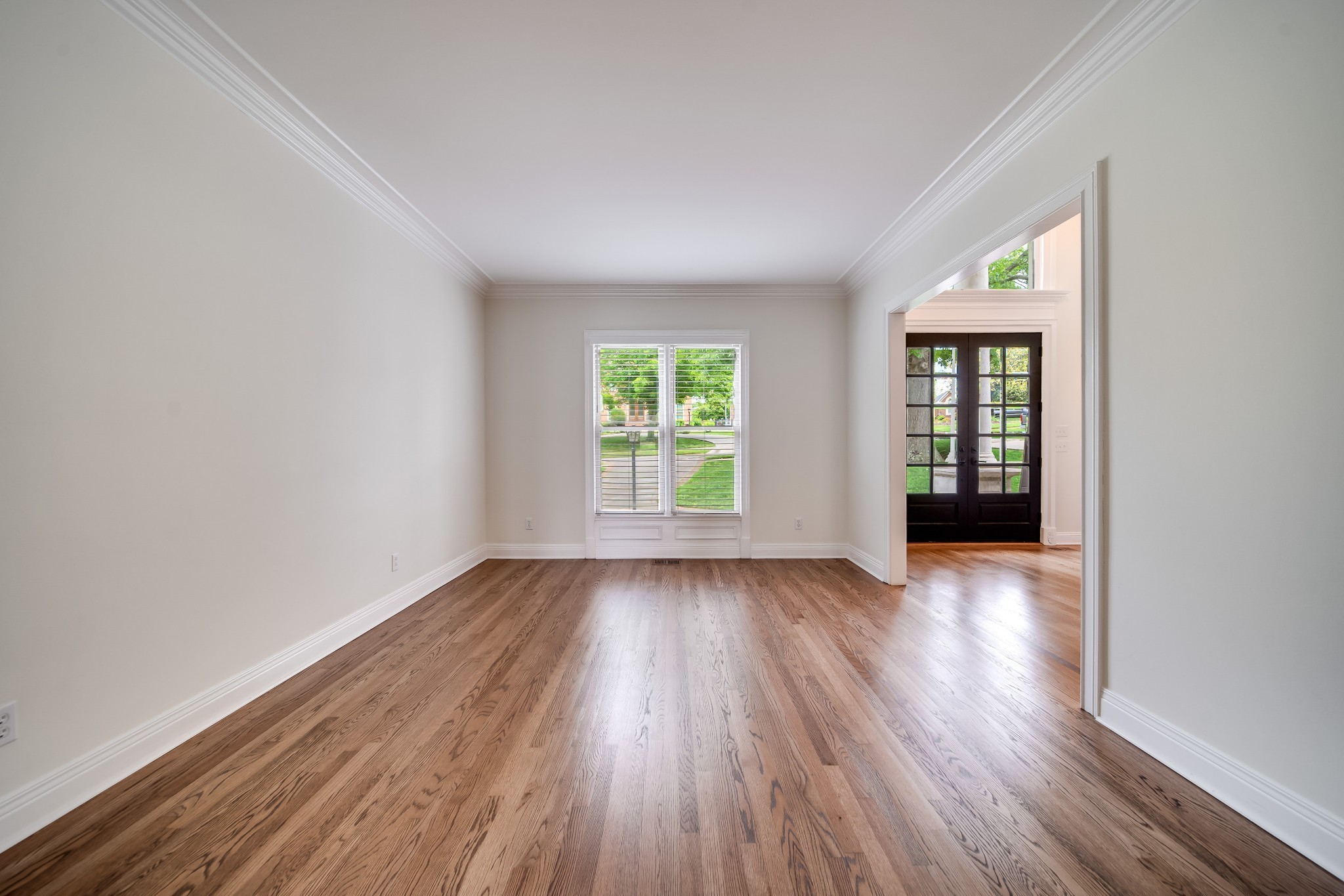 116 Foxcross Road Hendersonville, TN 37075 - Photo 7 of 57 an empty room with wooden floor and windows