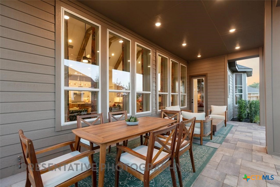 315 Leaning Rock Ridge Austin, TX 78737 - Photo 31 of 40 a outdoor dining space with furniture and outdoor view