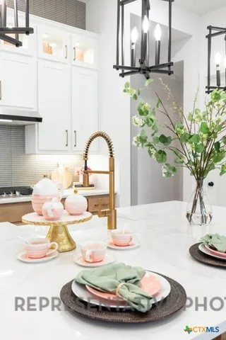 a vase of flowers sitting on a table